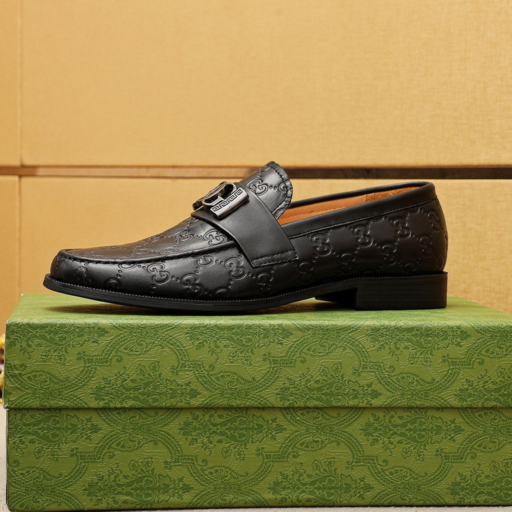 GUCCI Black Embossed Leather Loafers — side
