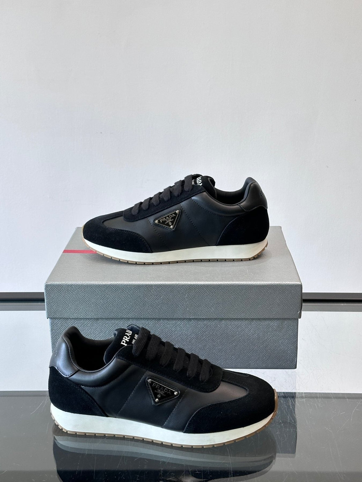 Prada Black Triangle Detail Sneakers — side