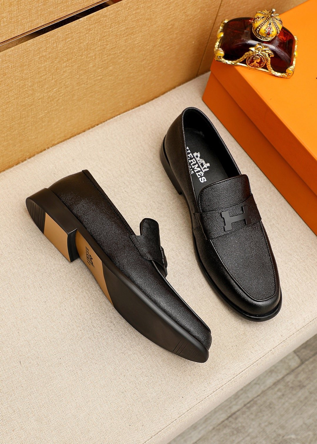 Hermès Black Textured Leather Loafers — front