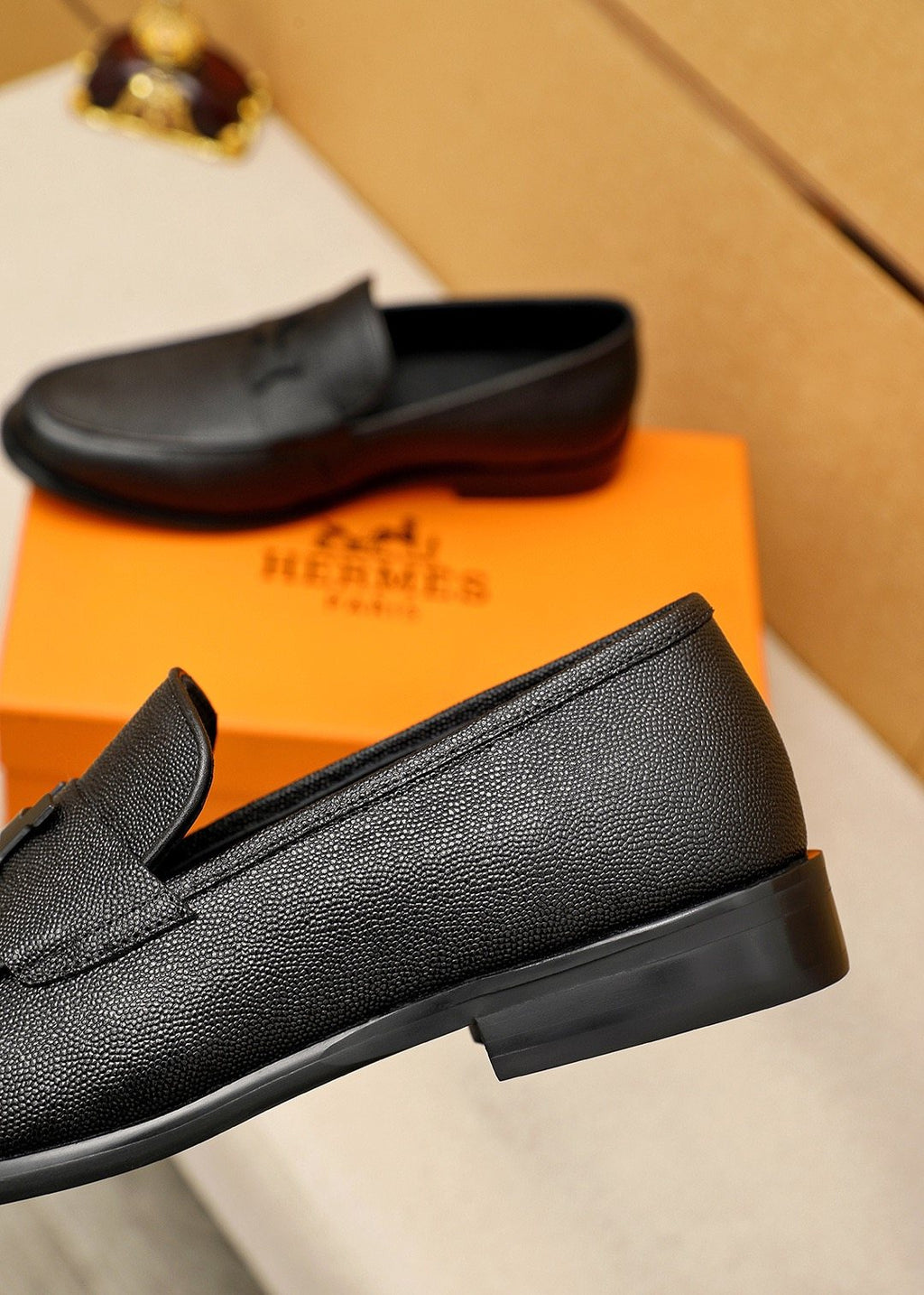 Hermès Black Textured Leather Loafers — side