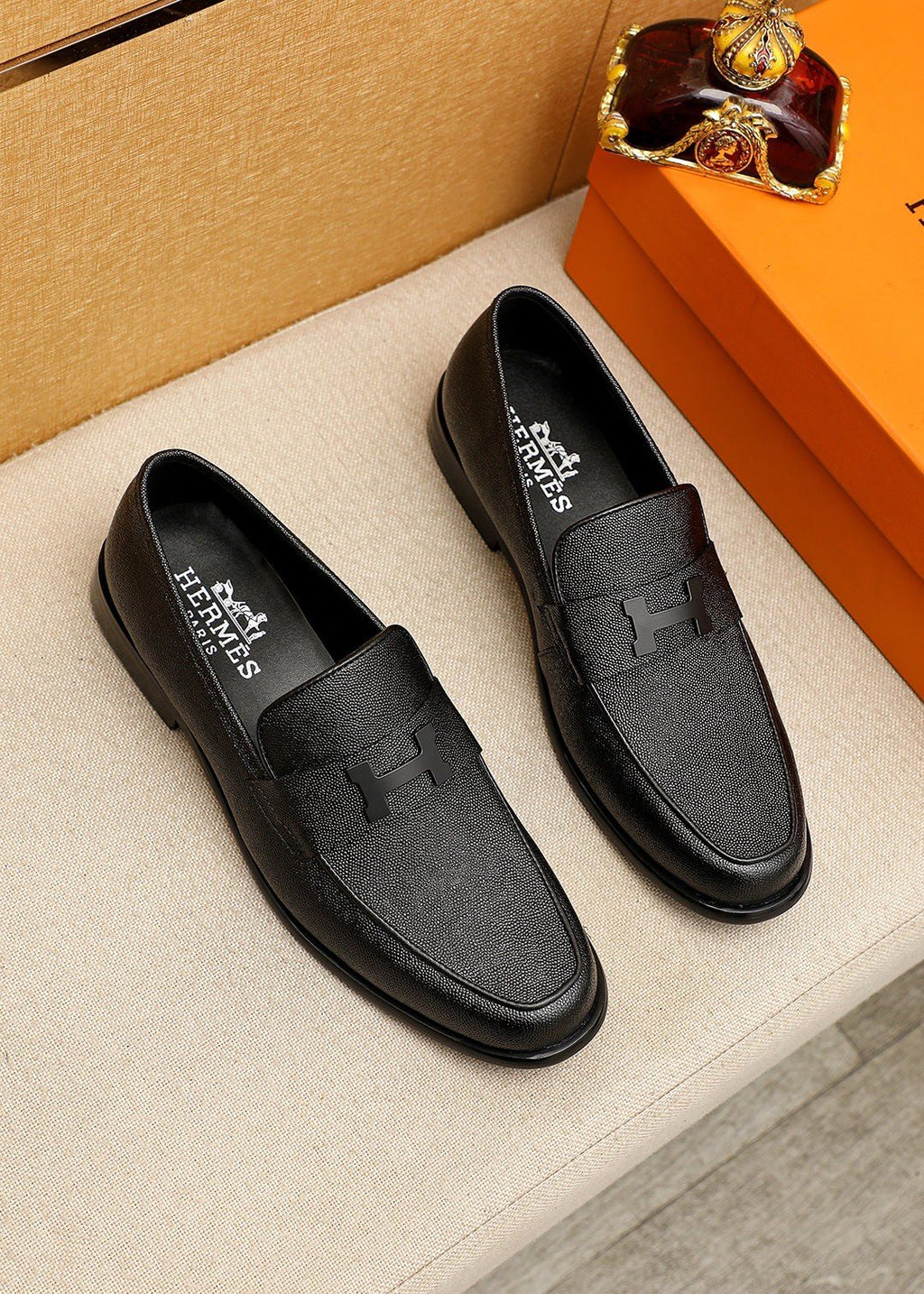 Hermès Black Textured Leather Loafers — hero