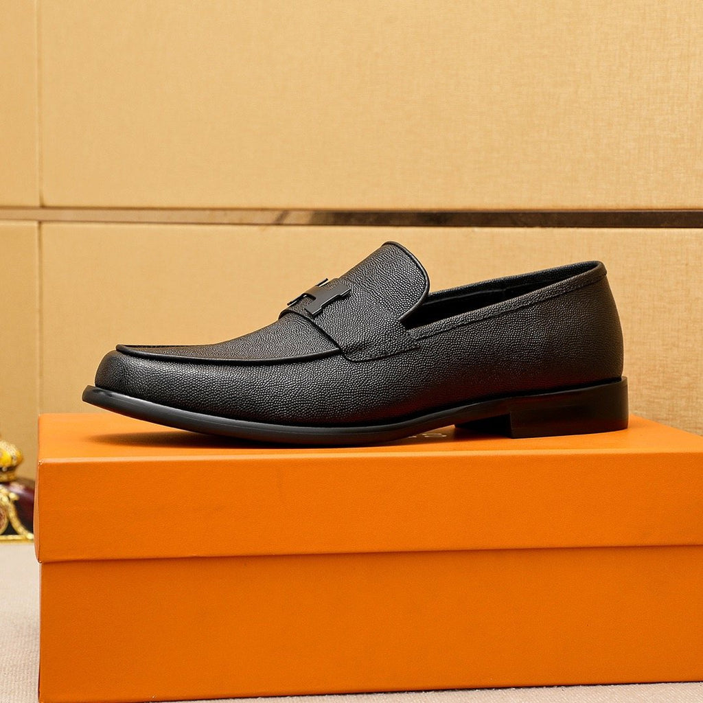 Hermès Black Textured Leather Loafers — side