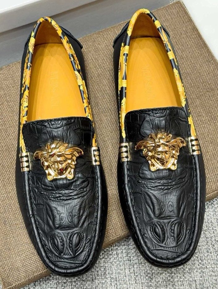 Versace Black Gold Hardware Loafers — hero