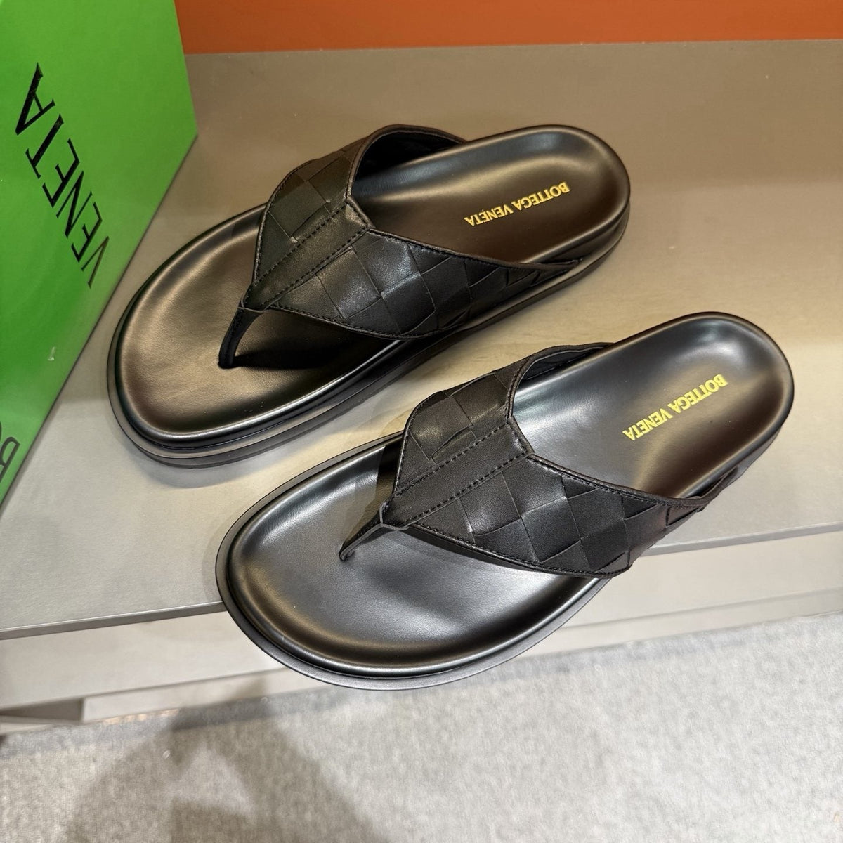 Bottega Veneta Black Woven Thong Sandals — front