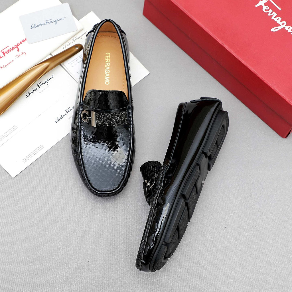 Ferragamo Black Embossed Slip-On Loafers — front