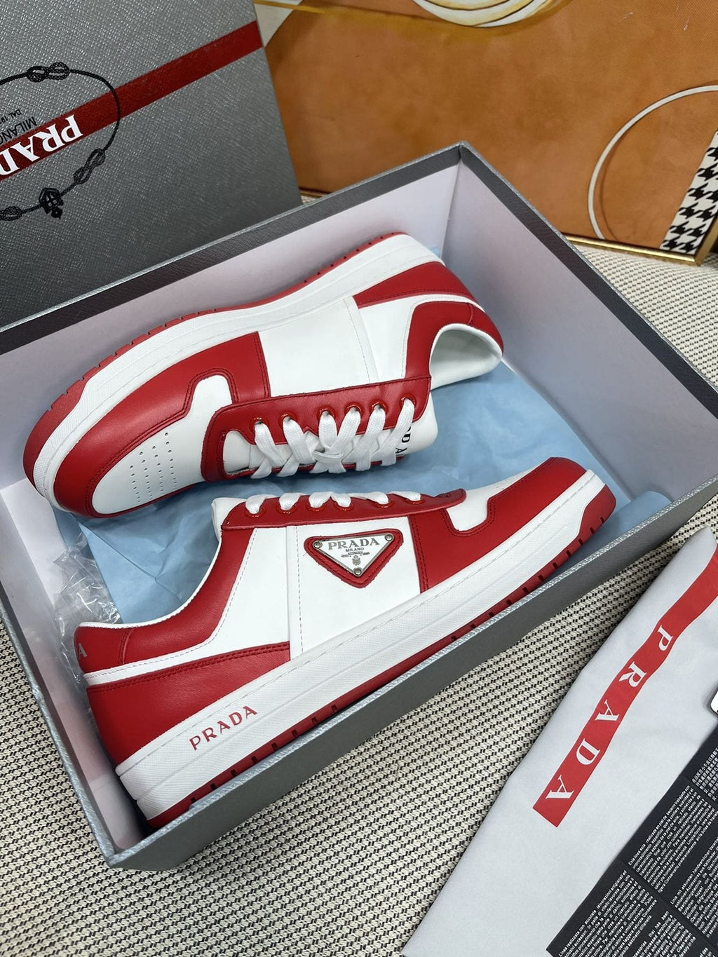 Prada Red and White Low-Top Sneakers — side