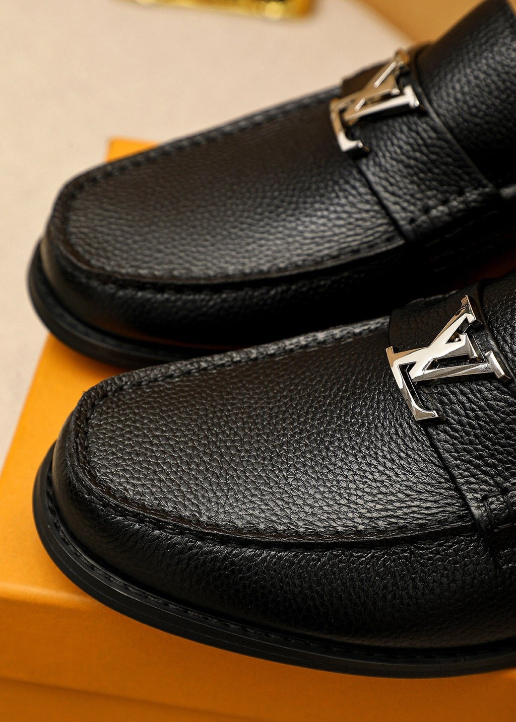 Louis Vuitton Black Pebbled Loafers — detail