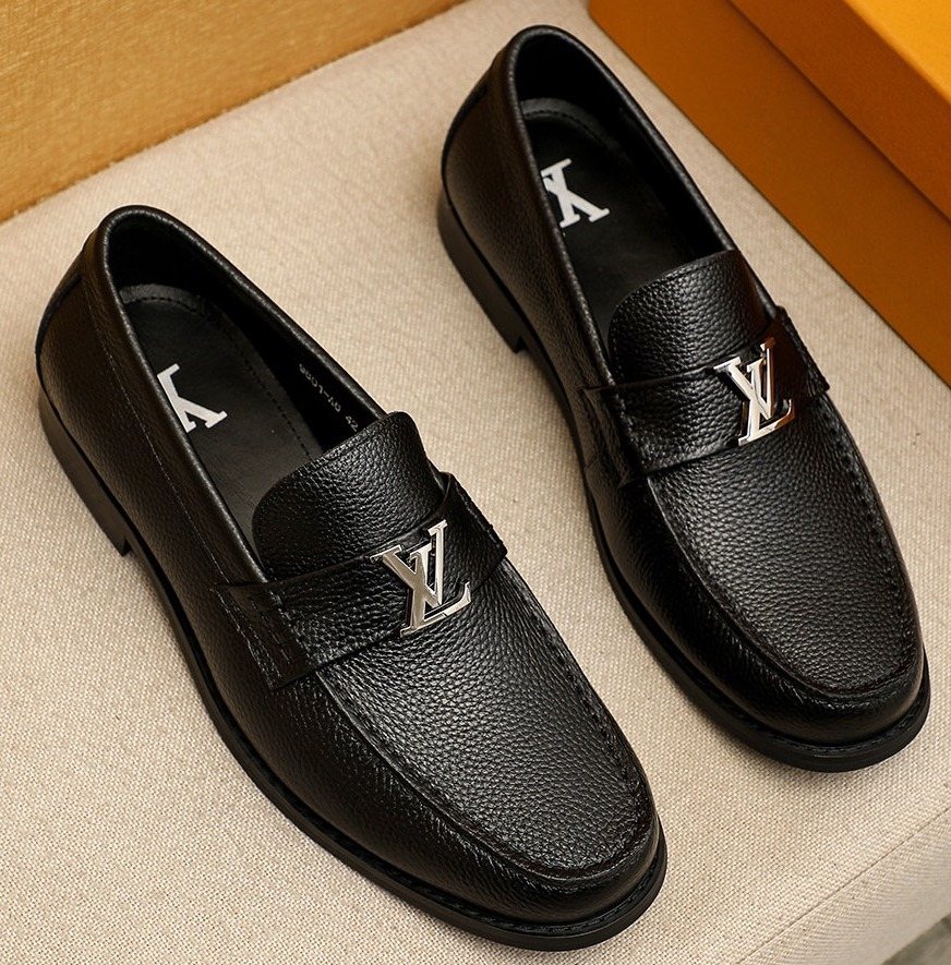 Louis Vuitton Black Pebbled Loafers — front