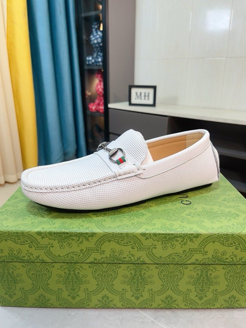 Gucci Perforated Metal Hardware Loafers — front