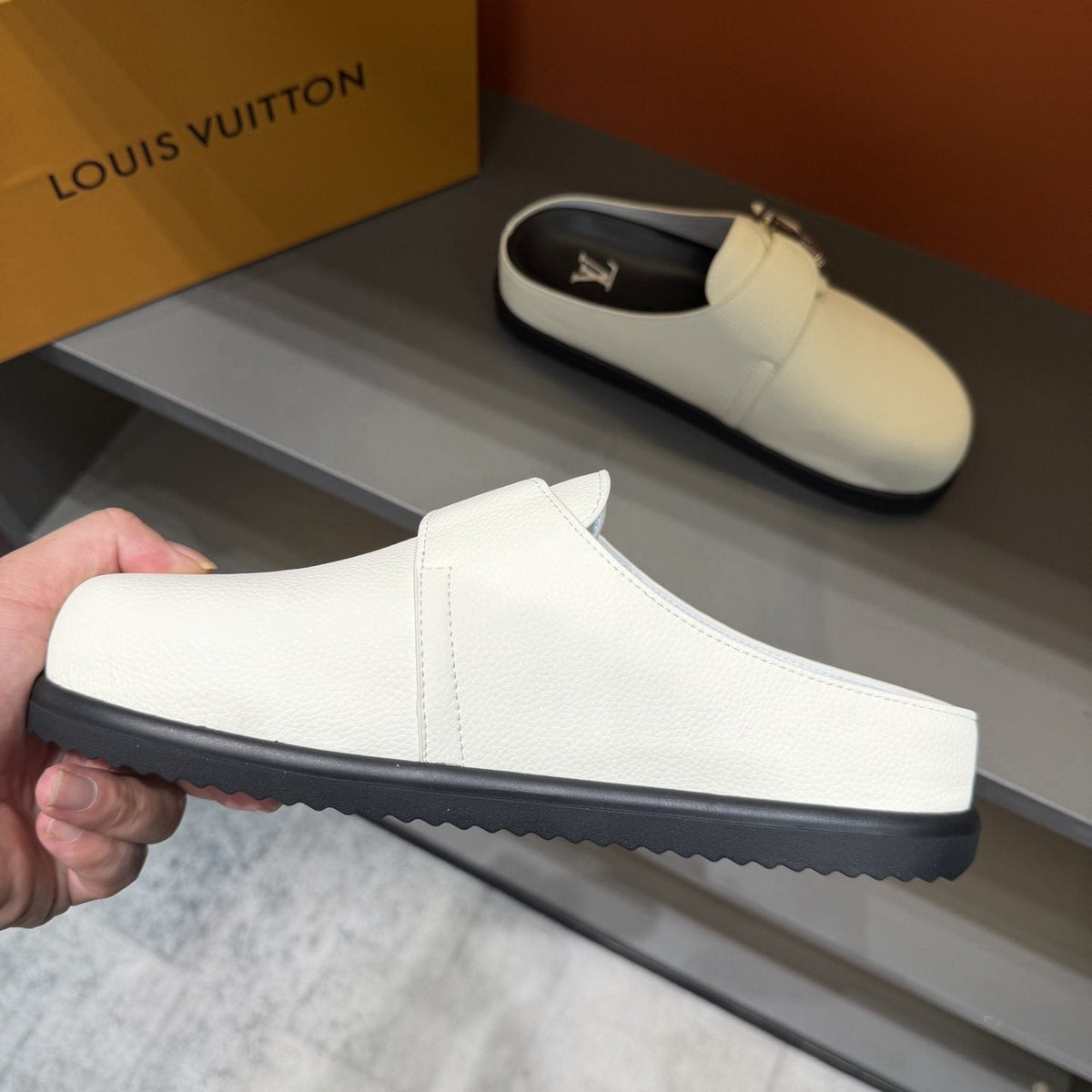 Louis Vuitton Textured Buckle Mule Sandals — front