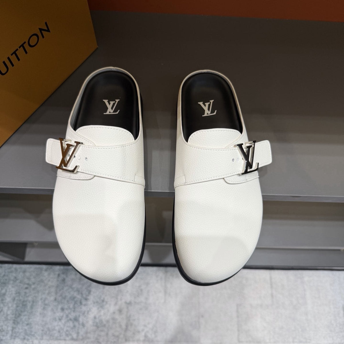 Louis Vuitton Textured Buckle Mule Sandals — front