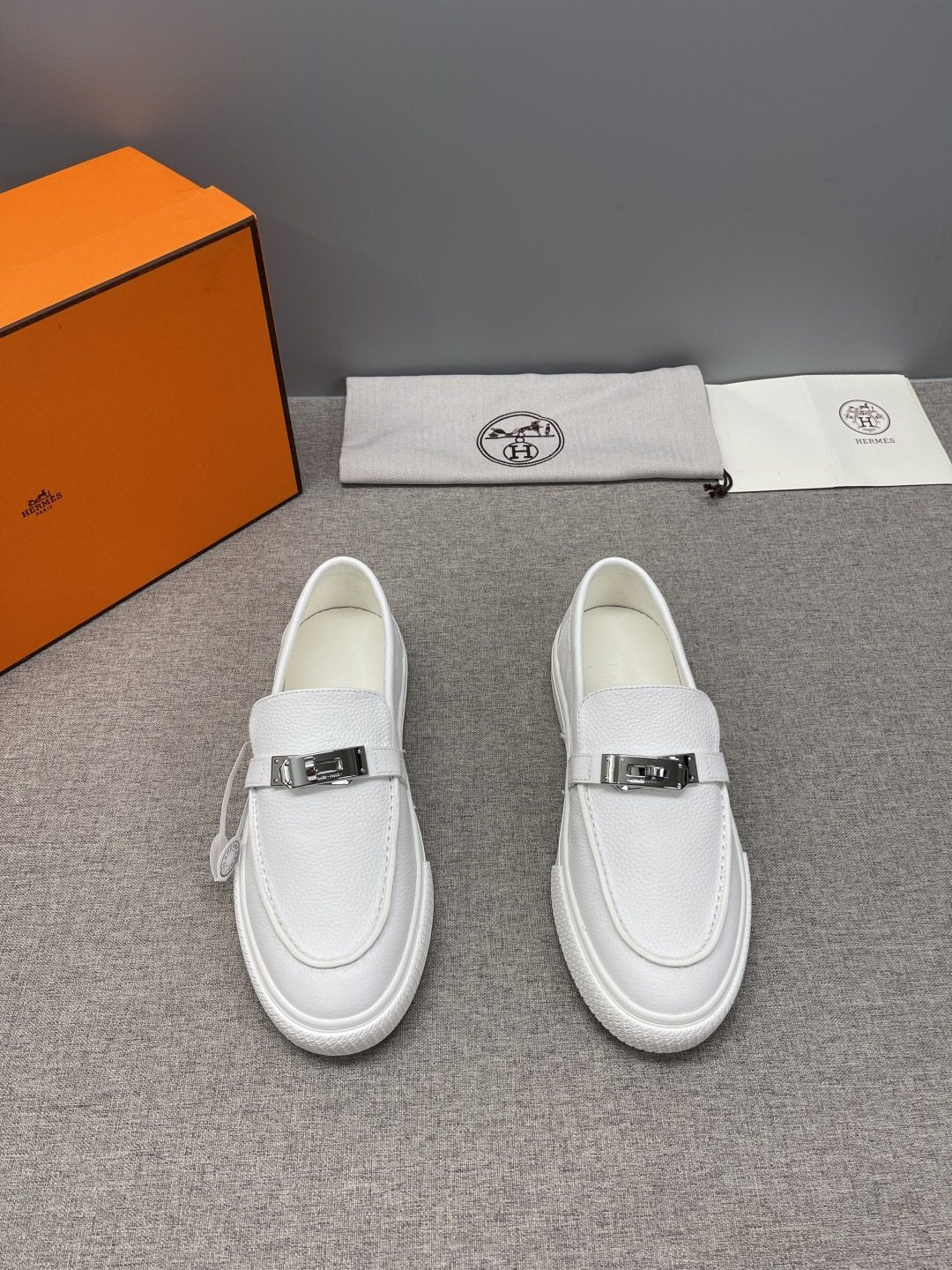 Hermès Textured Bar Loafers — front