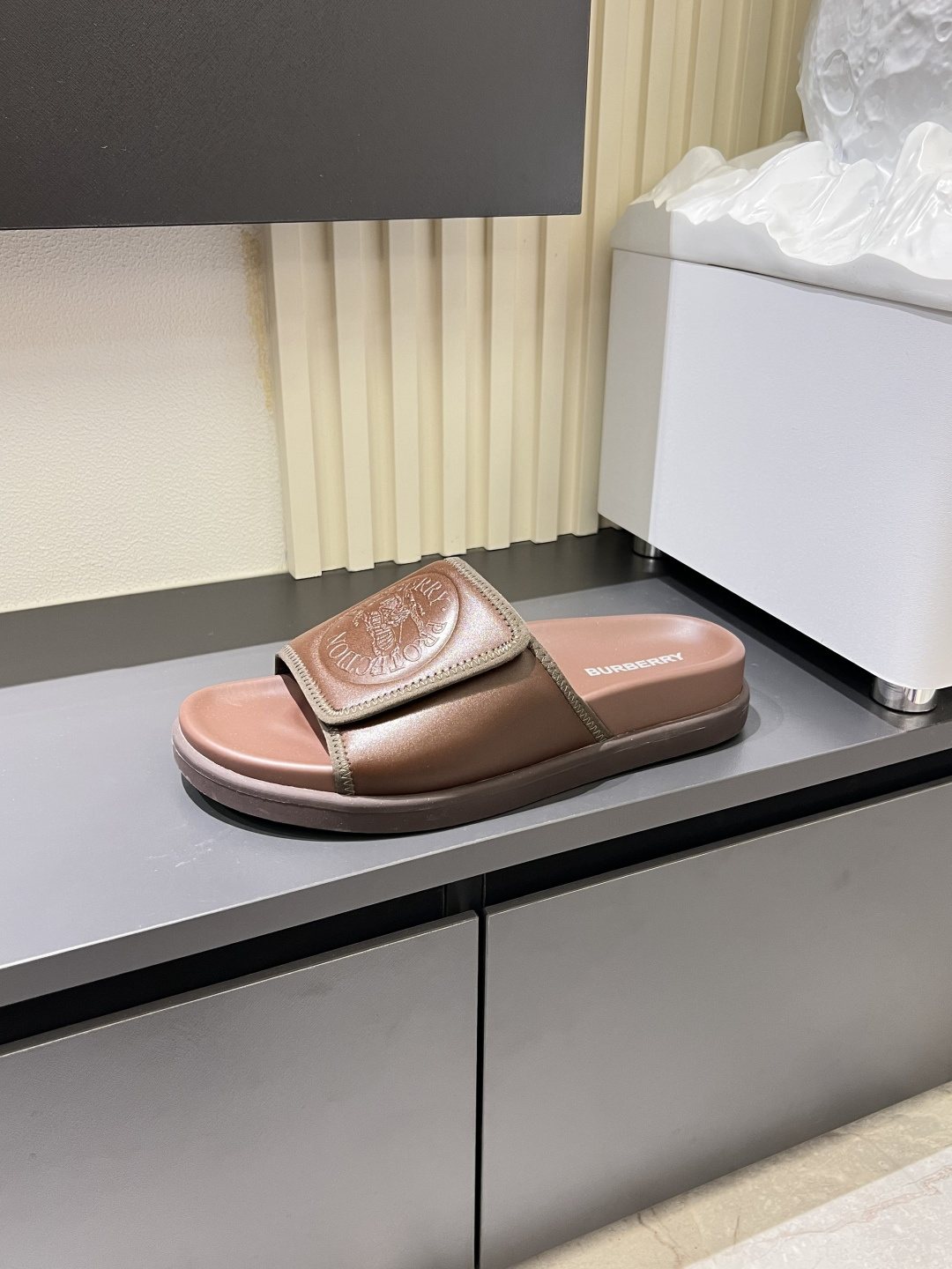 Burberry Embossed Check Slide Sandals — model