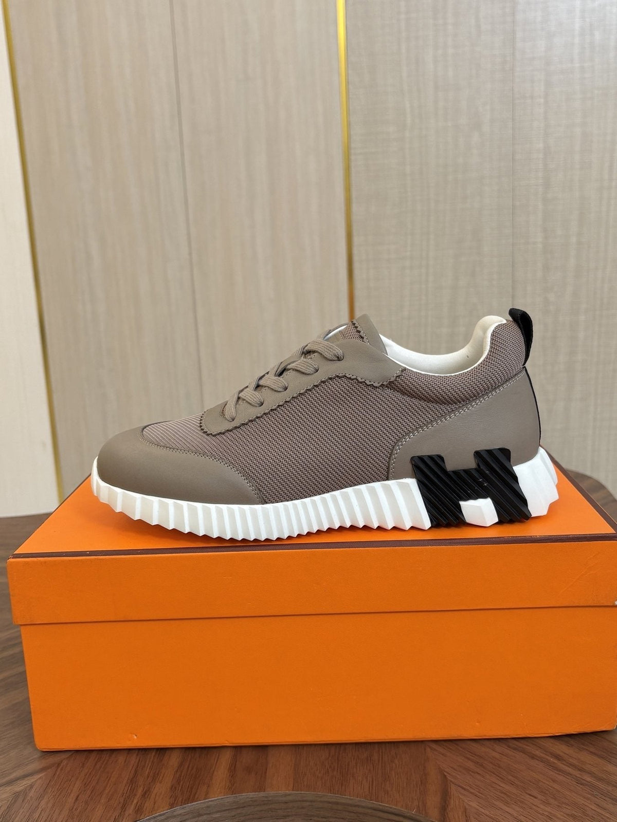 Hermes Black Ribbed Sole Sneakers — side