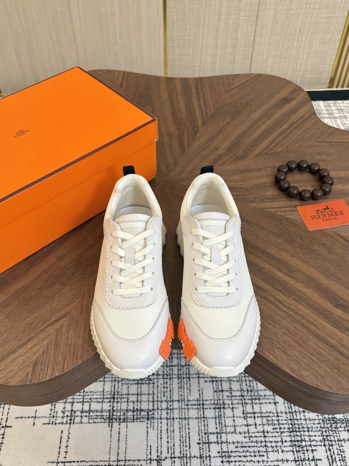 Hermes Black Ribbed Sole Sneakers — front