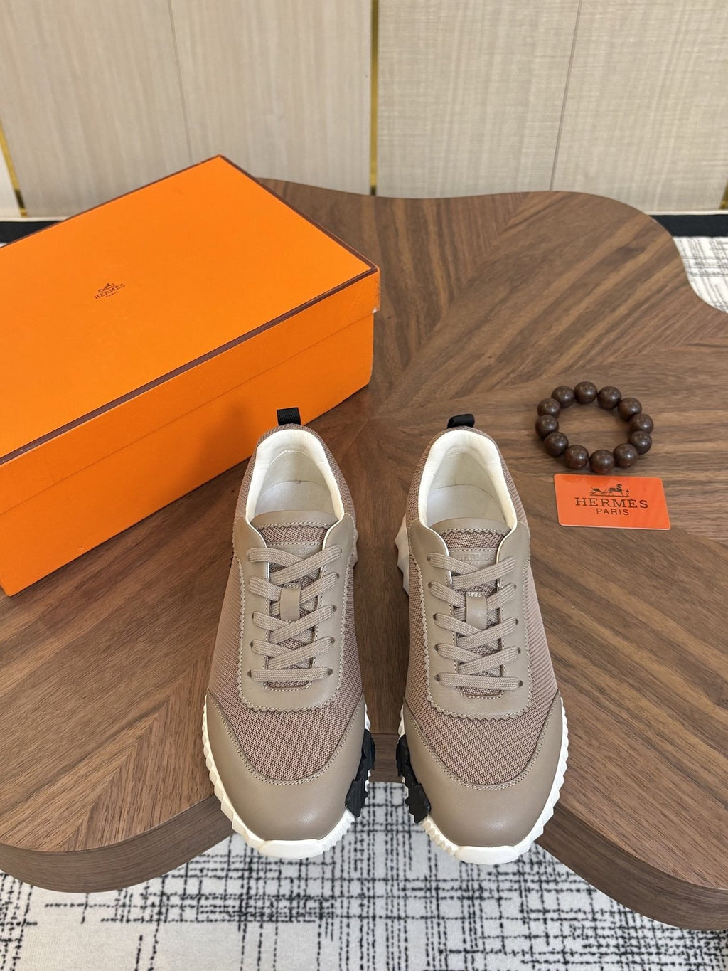 Hermes Black Ribbed Sole Sneakers — front