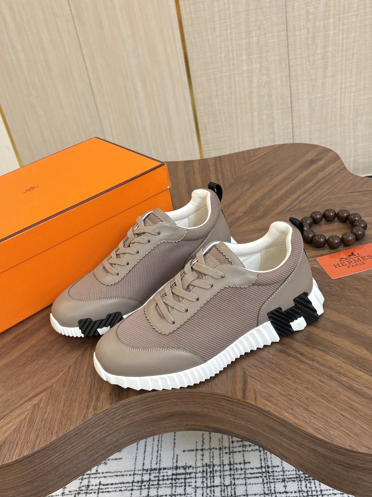 Hermes Black Ribbed Sole Sneakers — side