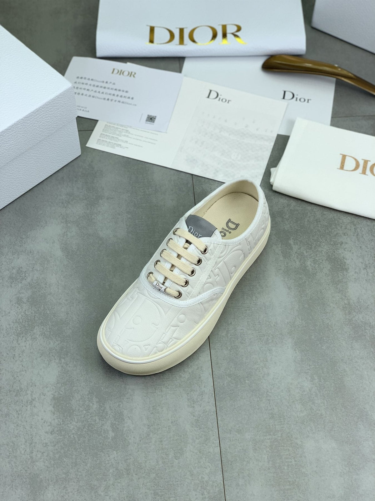 Dior White Embossed Low-Top Sneakers — front