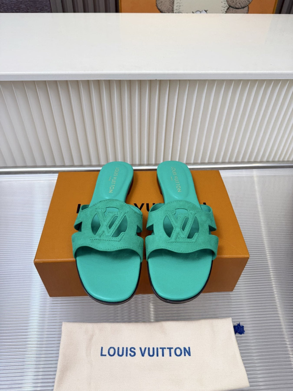Louis Vuitton Cutout Logo Slide Sandals — front
