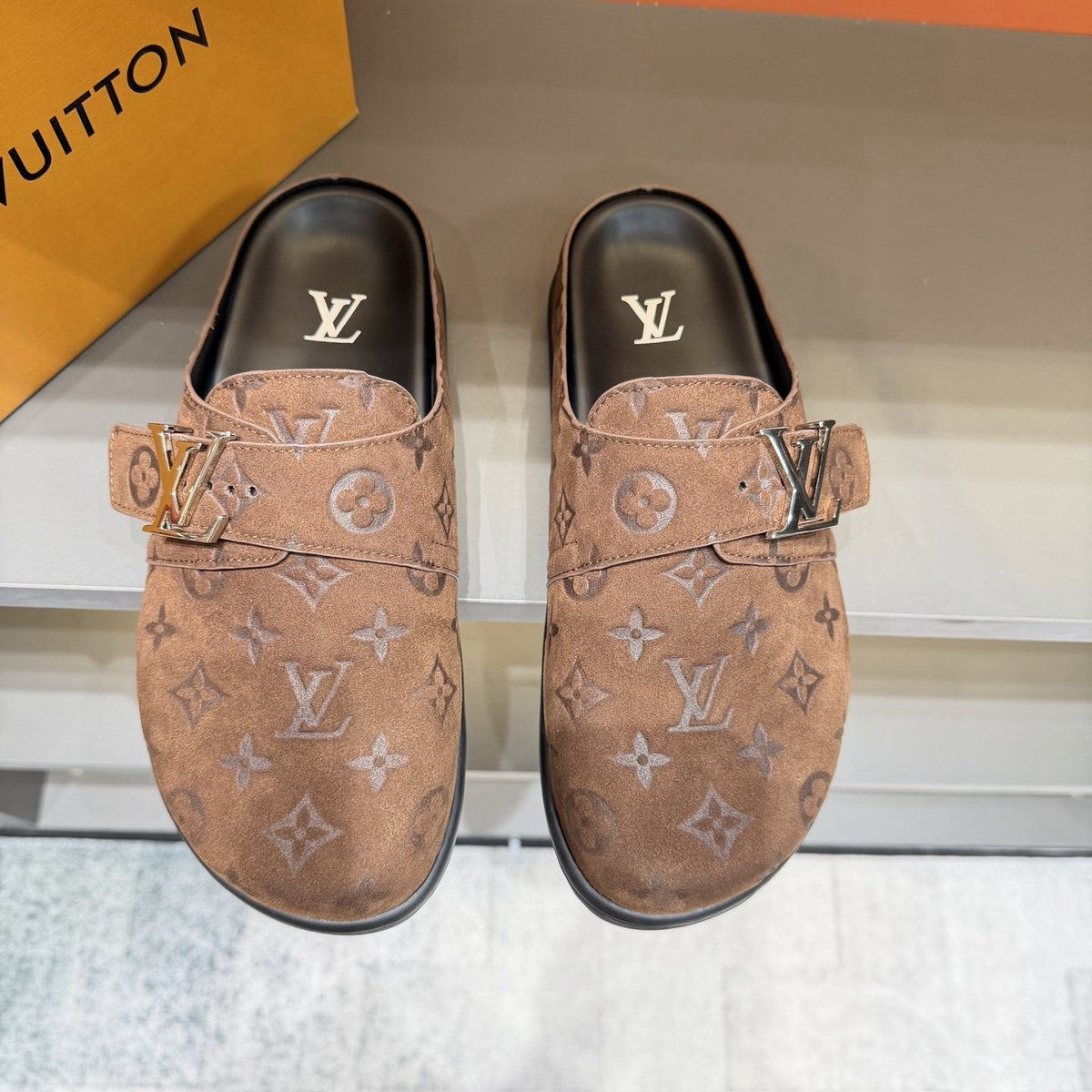 Louis Vuitton Embossed Buckle Slide Sandals — front