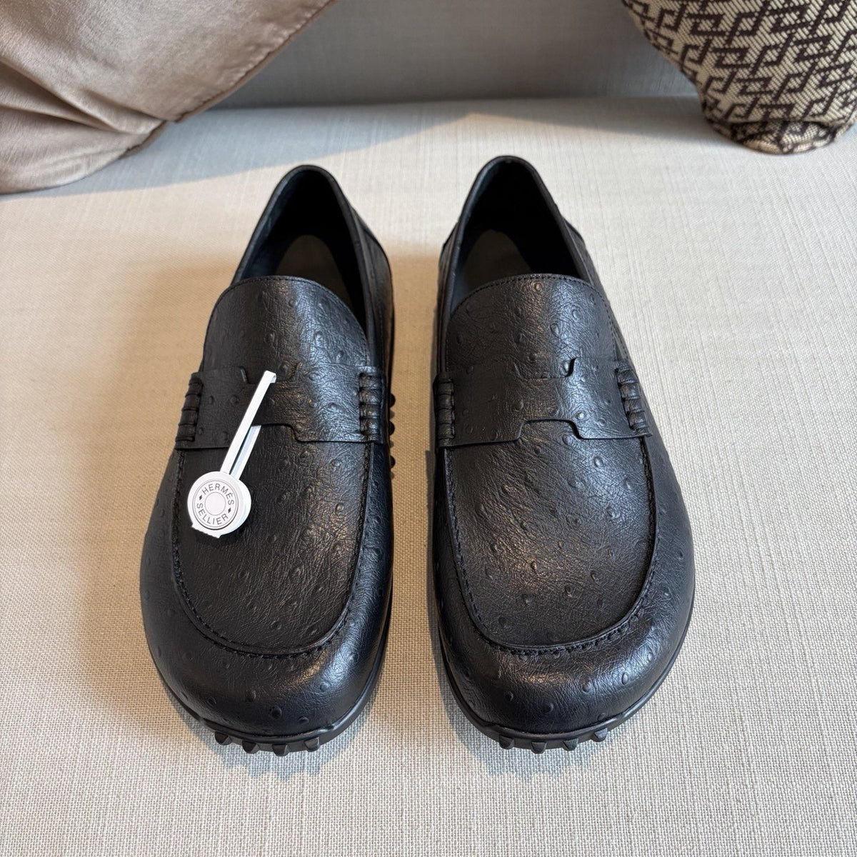 Hermès Textured Studded-Sole Loafers — front