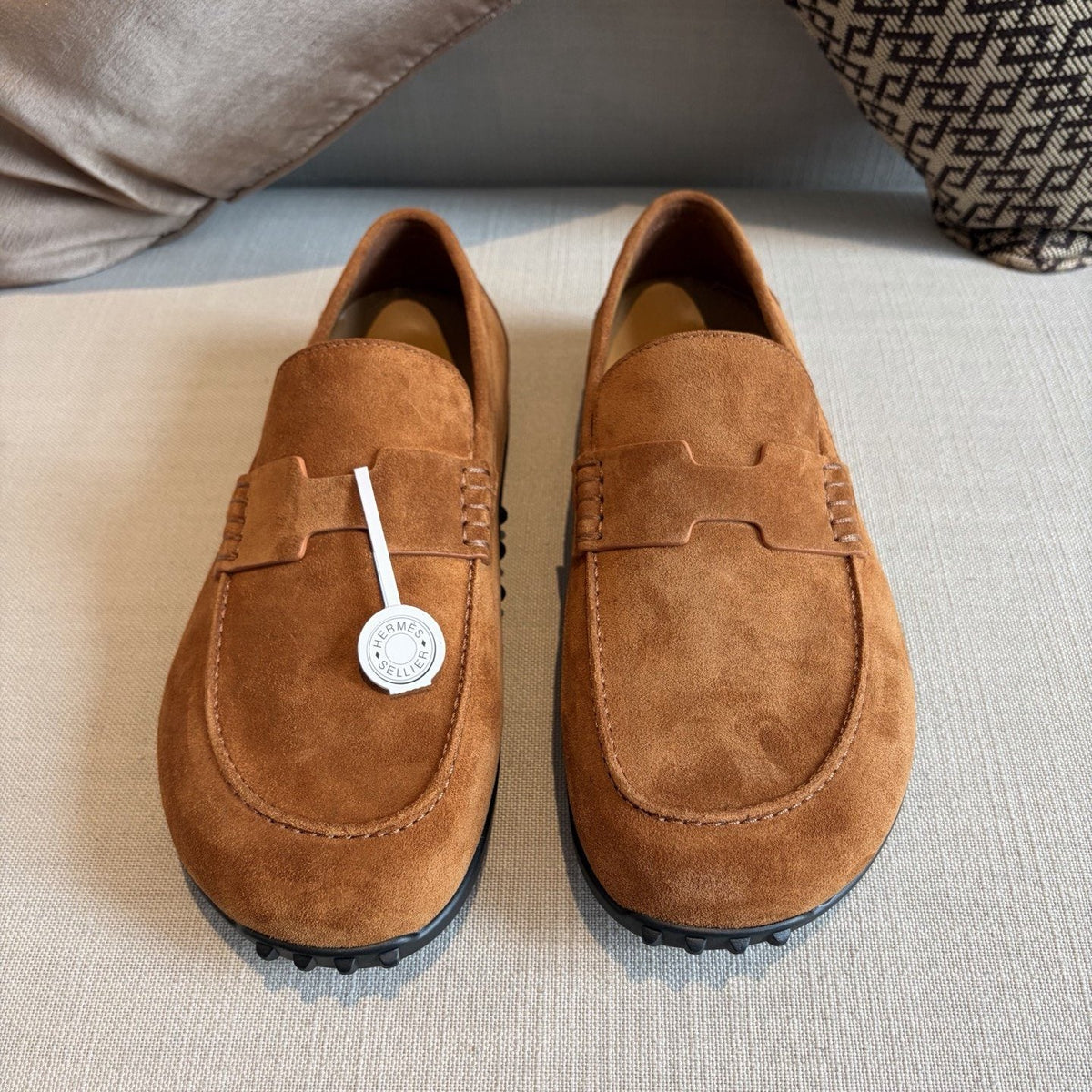 Hermès Textured Studded-Sole Loafers — front