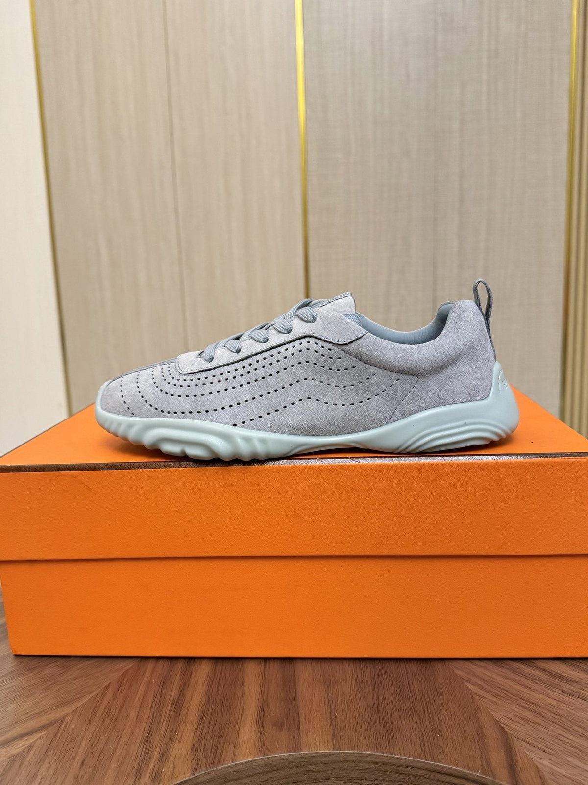 Hermès Perforated Low-Top Sneakers — front