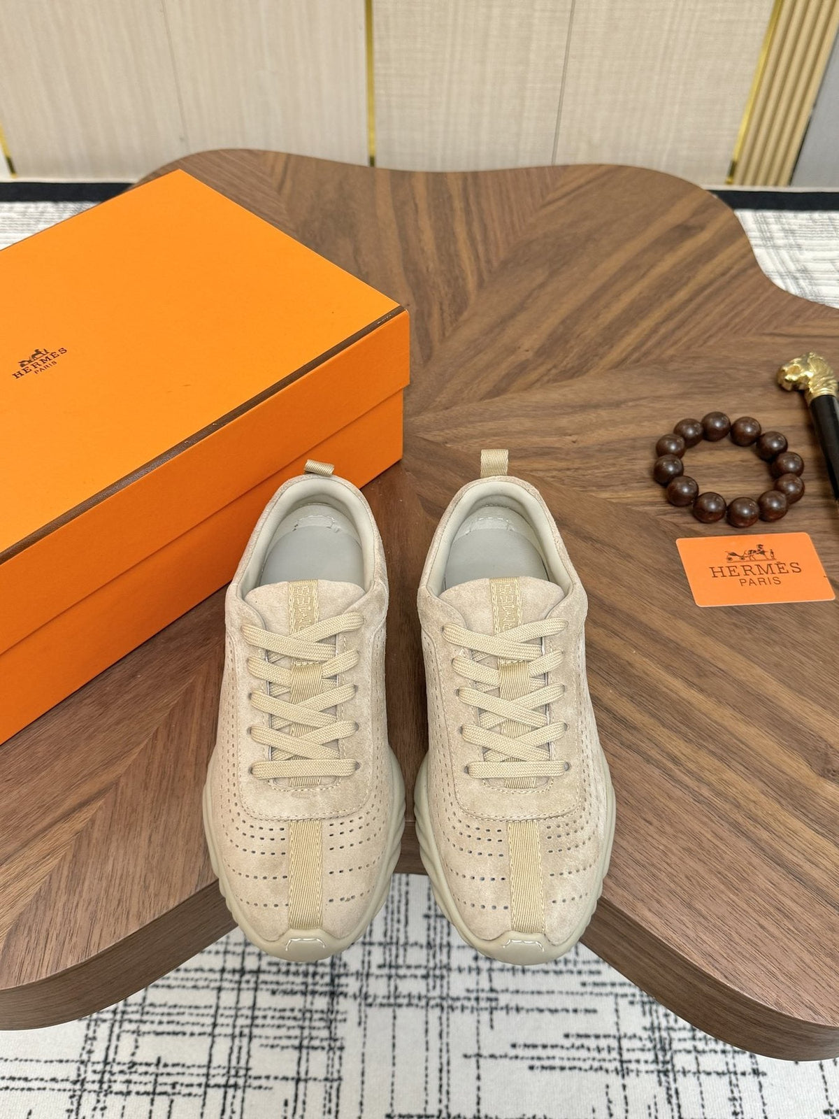 Hermès Perforated Low-Top Sneakers — front