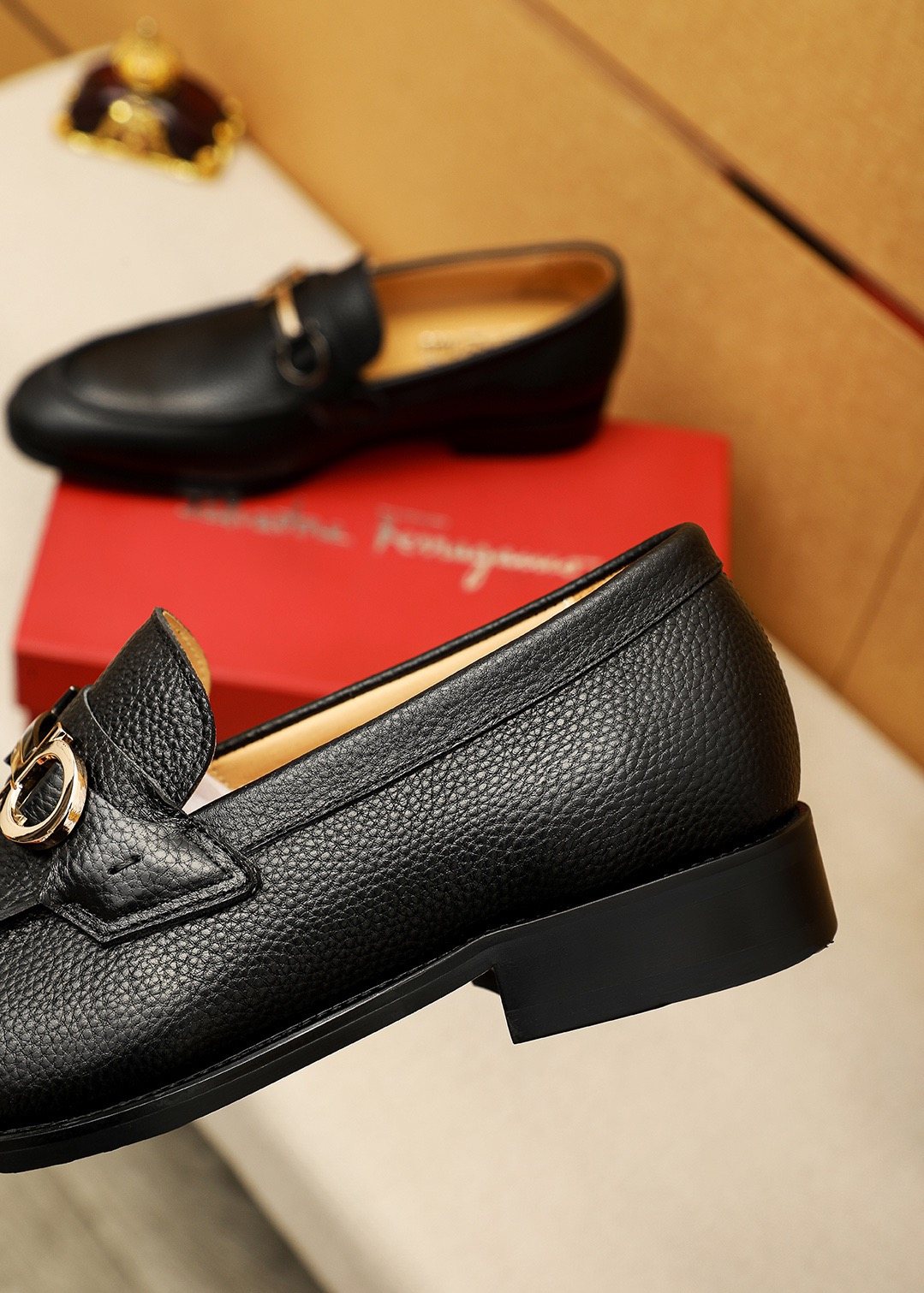 Ferragamo Pebble Leather Buckle Loafers — detail