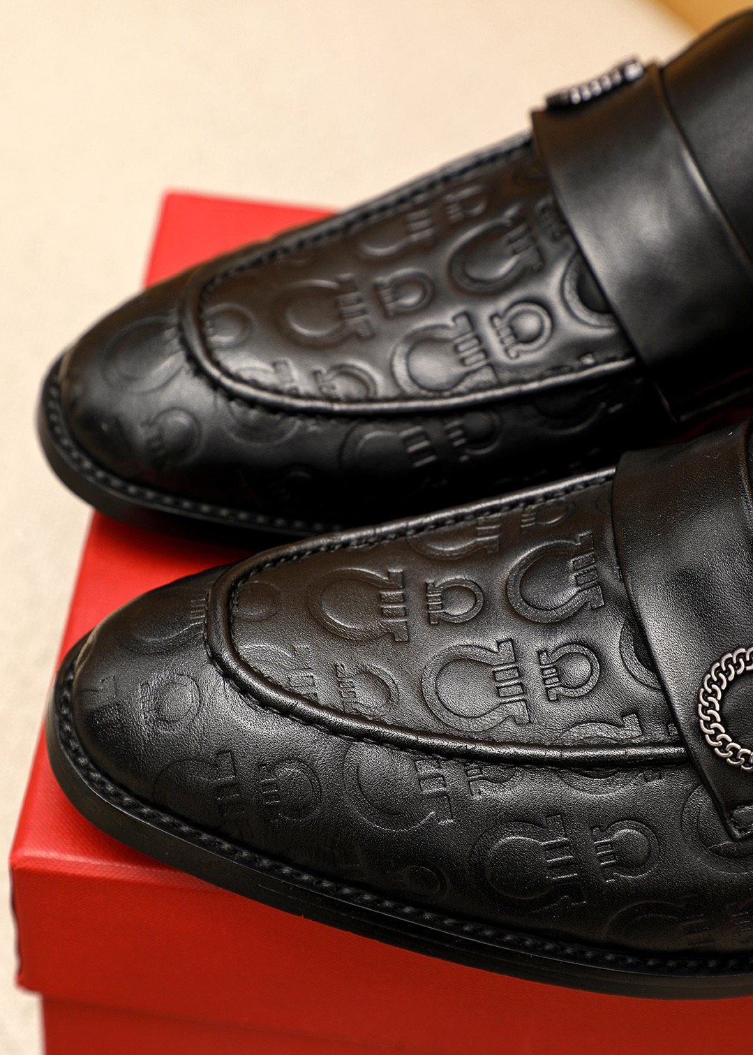 Ferragamo Burgundy Embossed Slip-On Shoes — detail