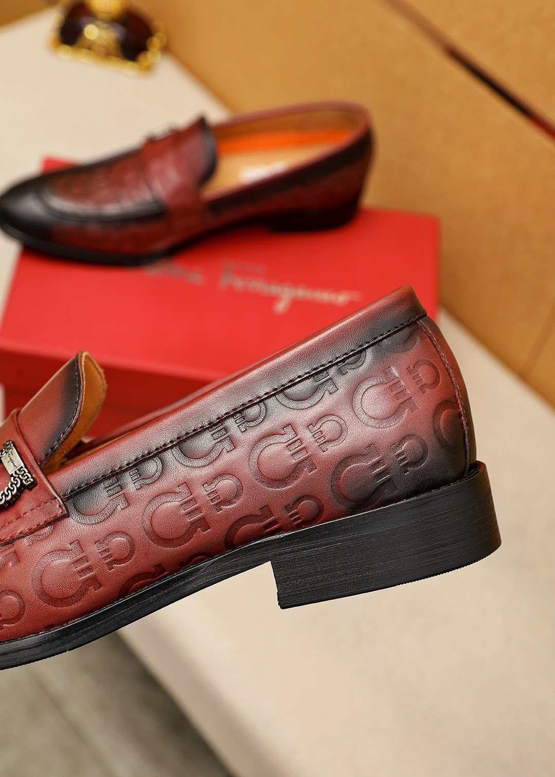 Ferragamo Burgundy Embossed Slip-On Shoes — detail
