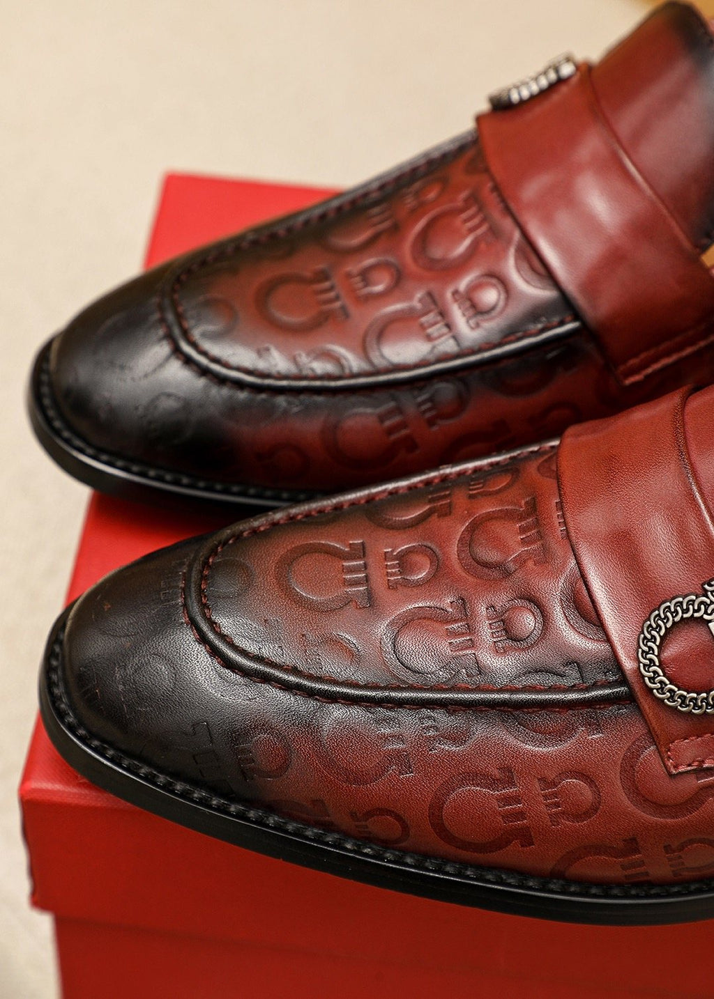 Ferragamo Burgundy Embossed Slip-On Shoes — detail