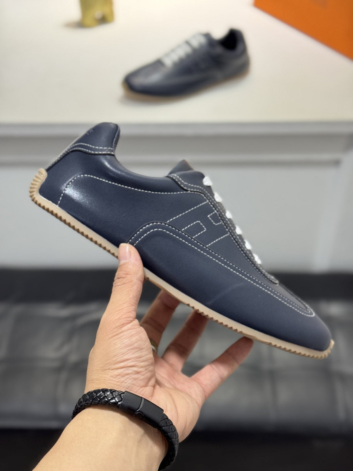 Hermès Contrast-Trim Low-Top Sneakers — side