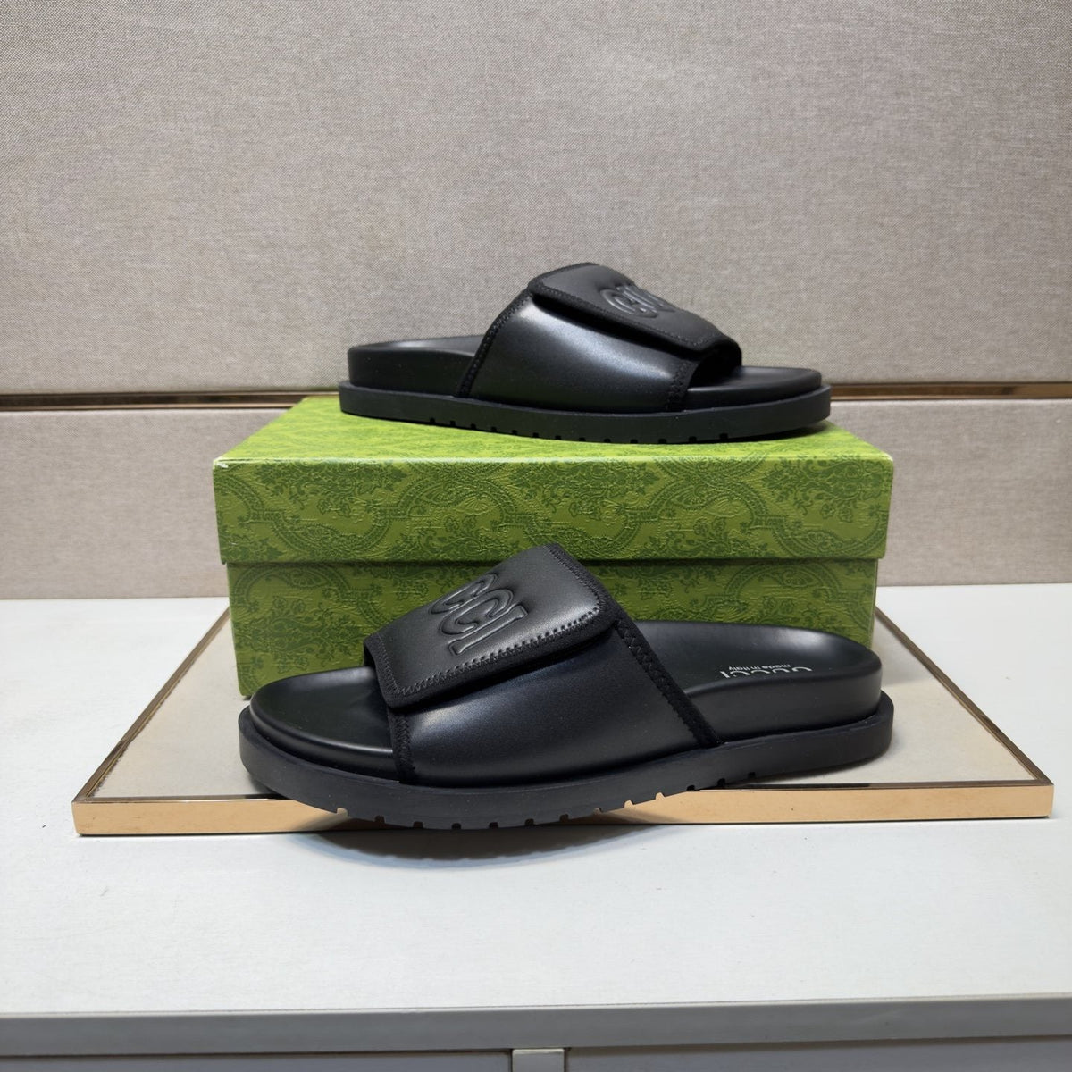 Gucci Raised Logo Slide Sandals — front