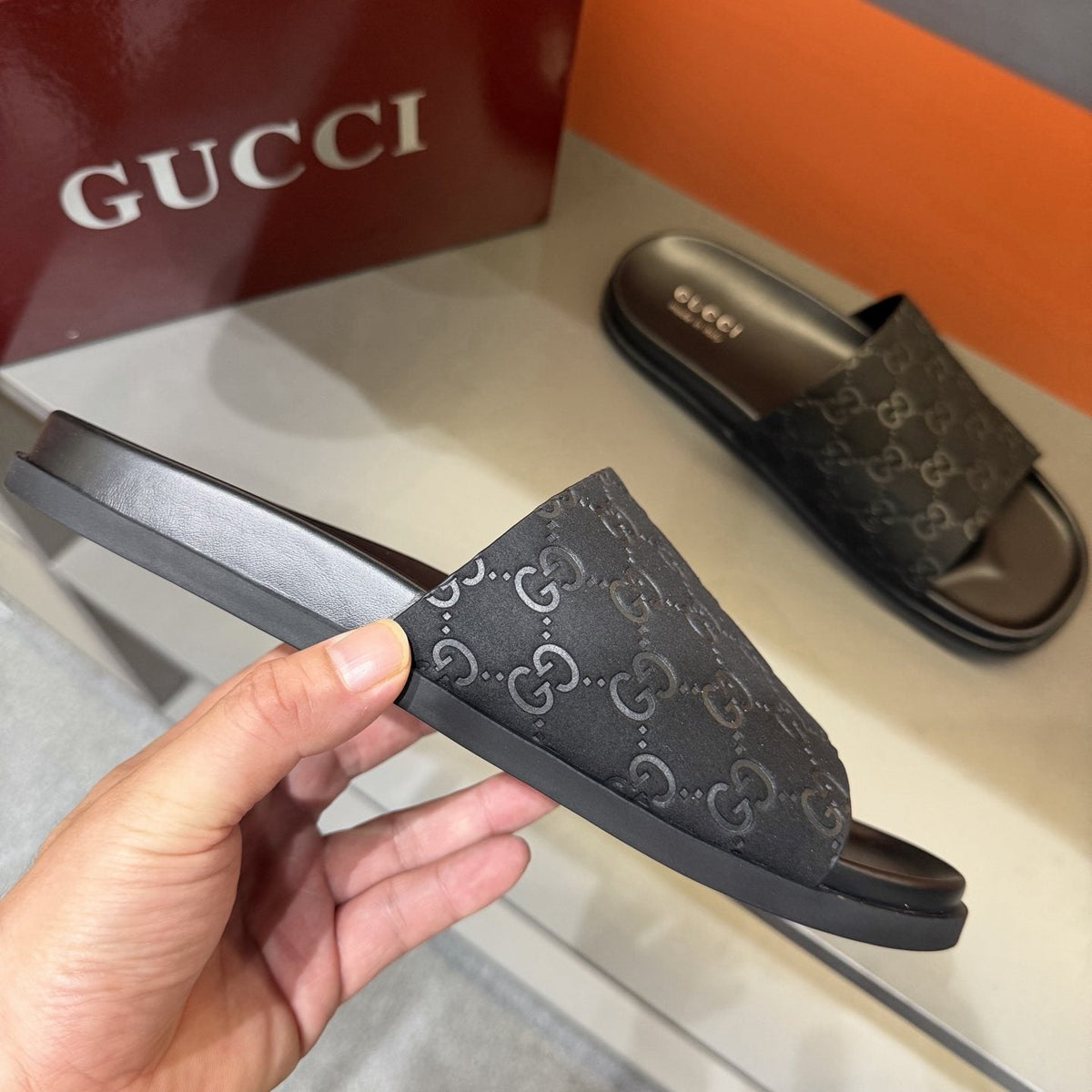 Gucci GG Monogram Crossover Slide Sandals — model
