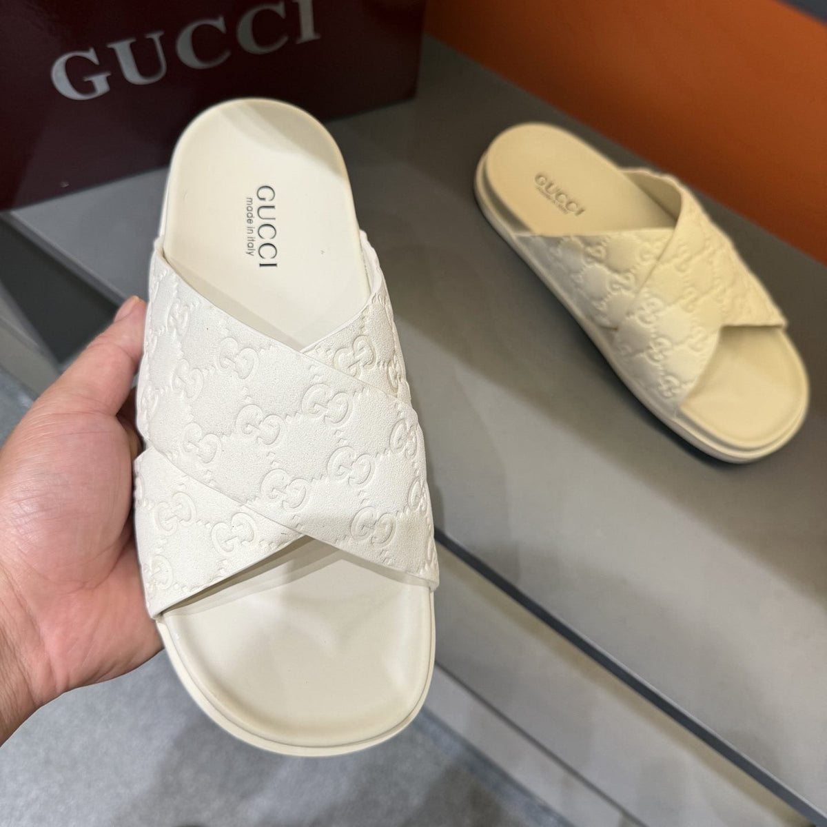 Gucci GG Monogram Crossover Slide Sandals — model